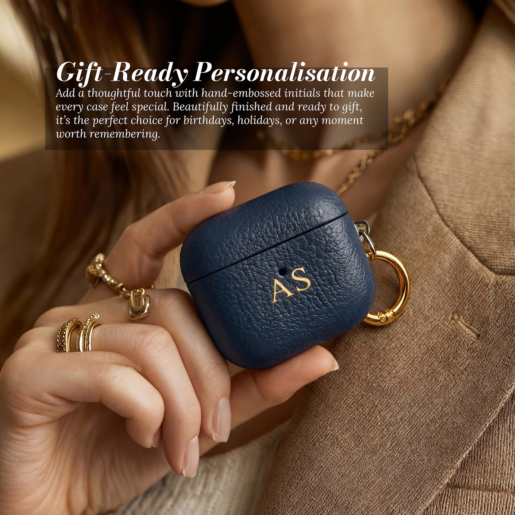Gift-ready personalisation — Navy Blue leather AirPods case in hand
