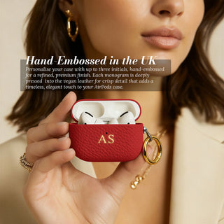 Hand-embossed initials - AirPods case open showing AirPods