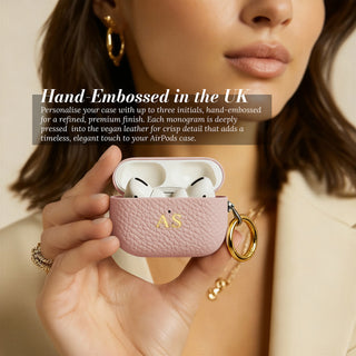 Hand-embossed initials - AirPods case open showing AirPods