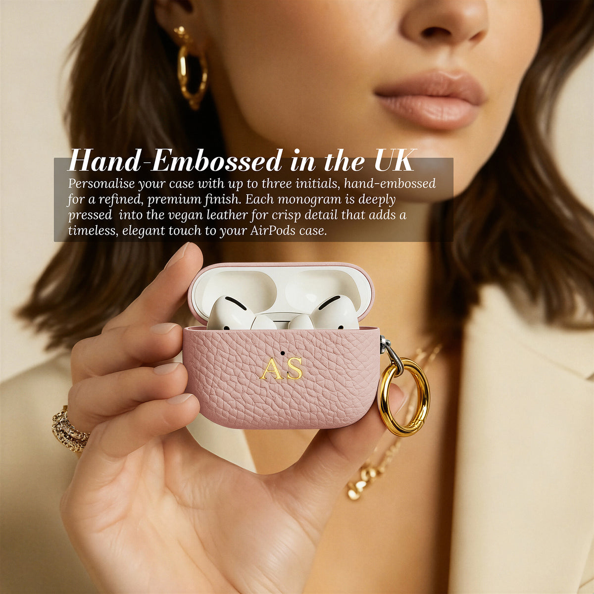 Hand-embossed initials - AirPods case open showing AirPods