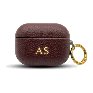 Personalised leather AirPods case in Burgundy with gold embossed initials