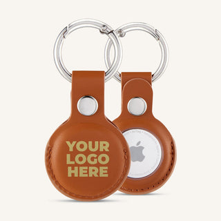 Brown AirTag holder with a printed logo